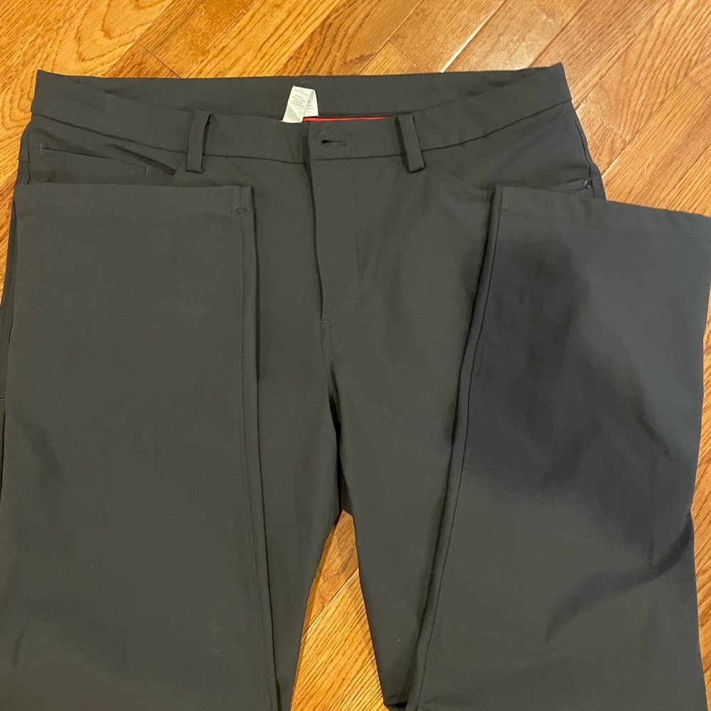 Lululemon. Men Black Trousers. Worn